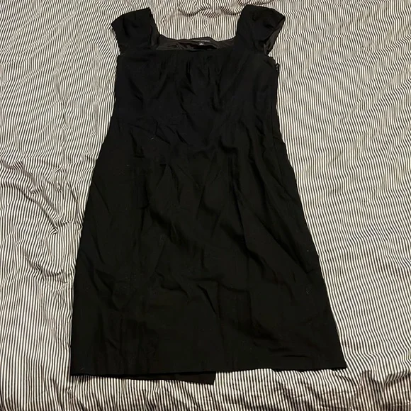 banana republic black wool dress Banana Republic black laine wool sleeveless dress w/ buttons mock neck size 4